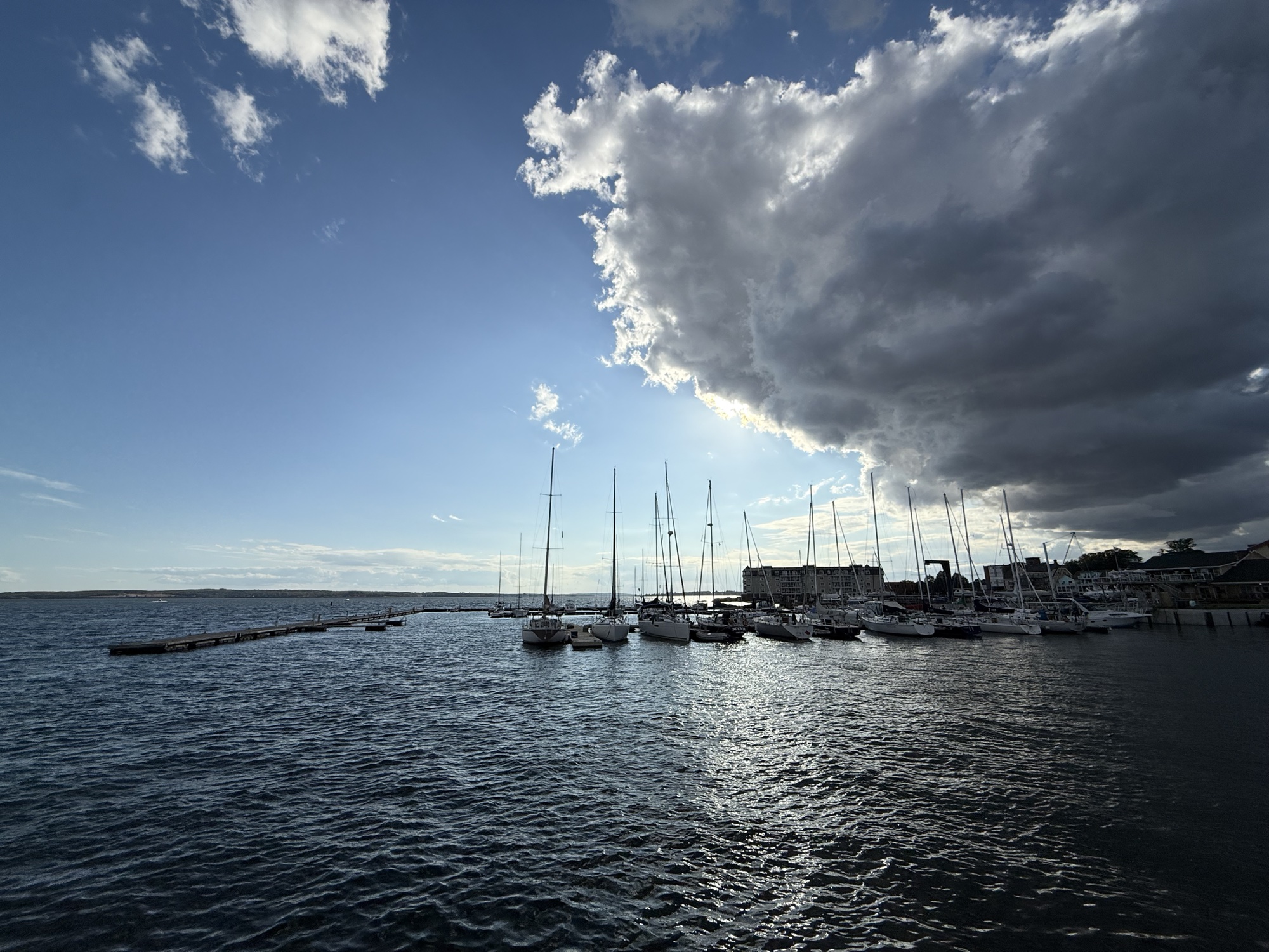 Marina and waterfront under a cloud-filled sky in Prince Edward Island
